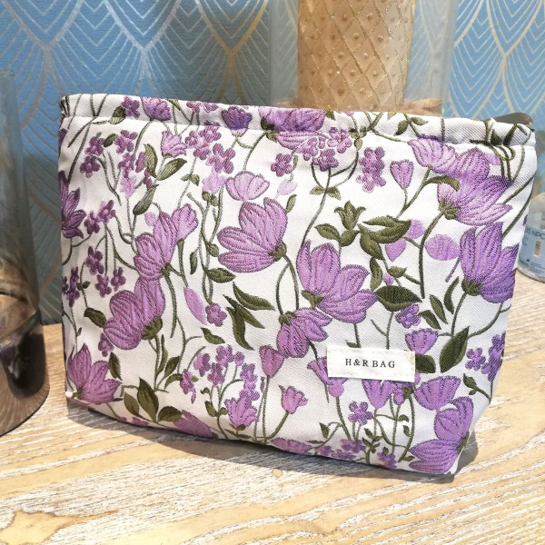 Trousse élégante motif floral violette